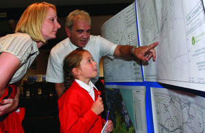 Stock image of a mother and daughter looking at a map during a drop-in consultation