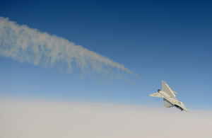 An RAF Typhoon from RAF Coningsby displays its agility above the clouds (stock image)
