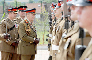 General Sir Timothy Granville-Chapman inspects soldiers