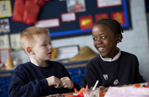 Children laughing in a classroom