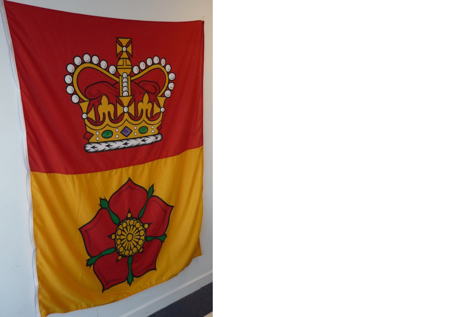 Hampshire flag hanging on a wall