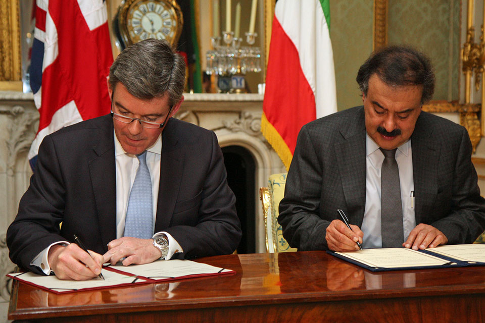 Foreign Office Minister Hugh Robertson and His Excellency Khaled Al Jarallah sign the UK-Kuwait Joint Steering Group Action Plan