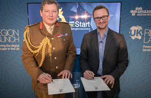 General Sir Chris Deverell co-signs the Covenant with Gavin Jackson, UK Managing Director at AWS.