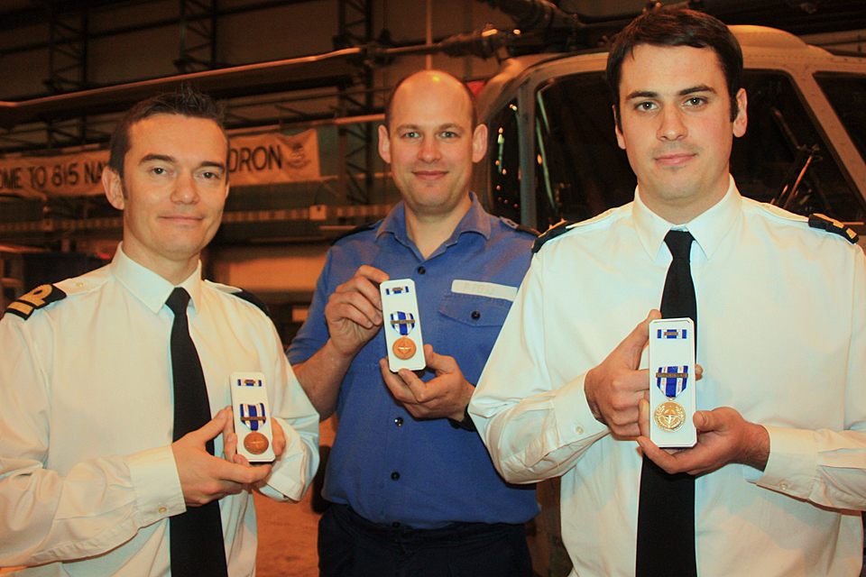 Naval Air Squadron personnel with their Operation Unified Protector medals