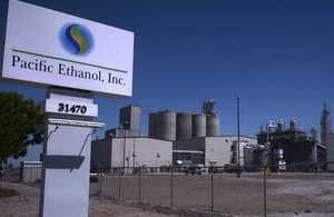 Long-distance picture of Pacific Ethanol plant with company signage in foreground