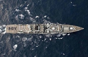 HMS Lancaster celebrates the birth of the Duke and Duchess of Cambridge's first child whilst on patrol in the Caribbean [Picture: Leading Airman (Photographer) Jay Allen, Crown copyright]