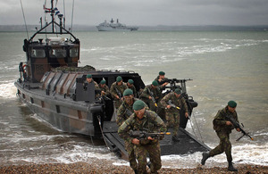 Young Royal Marines Commando Officers in training conducting a beach insertion exercise (library image) [Picture: Leading Airman (Photographer) Martin Carney, Crown Copyright/MOD 2012]