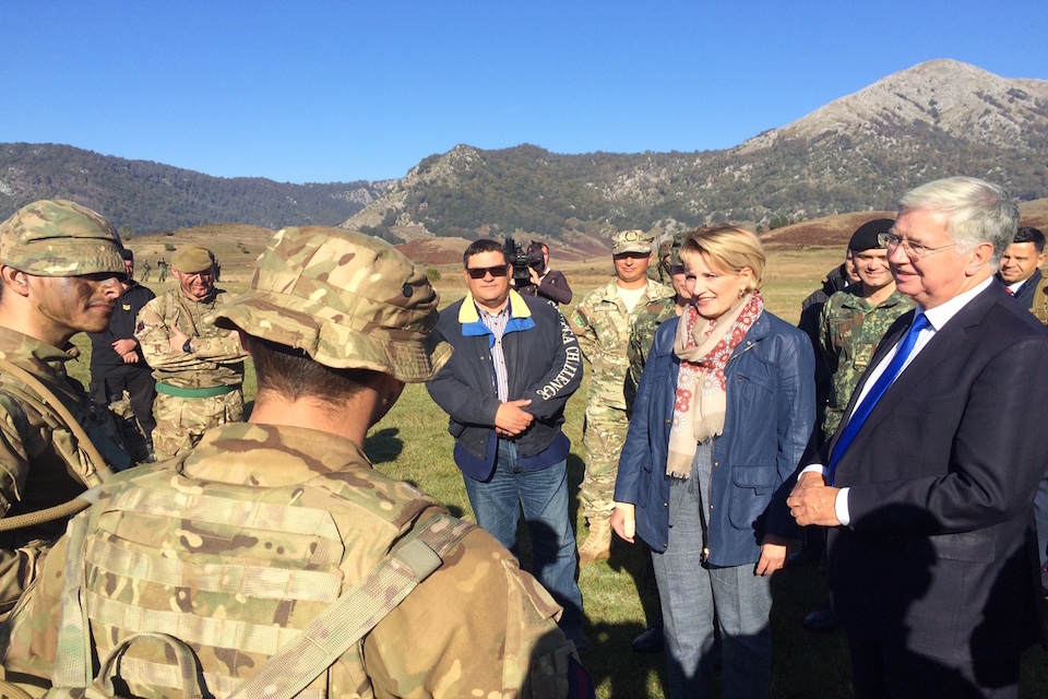 Michael Fallon and Albanian Defence Minister Mimi Kodheli meet troops at Biza.
