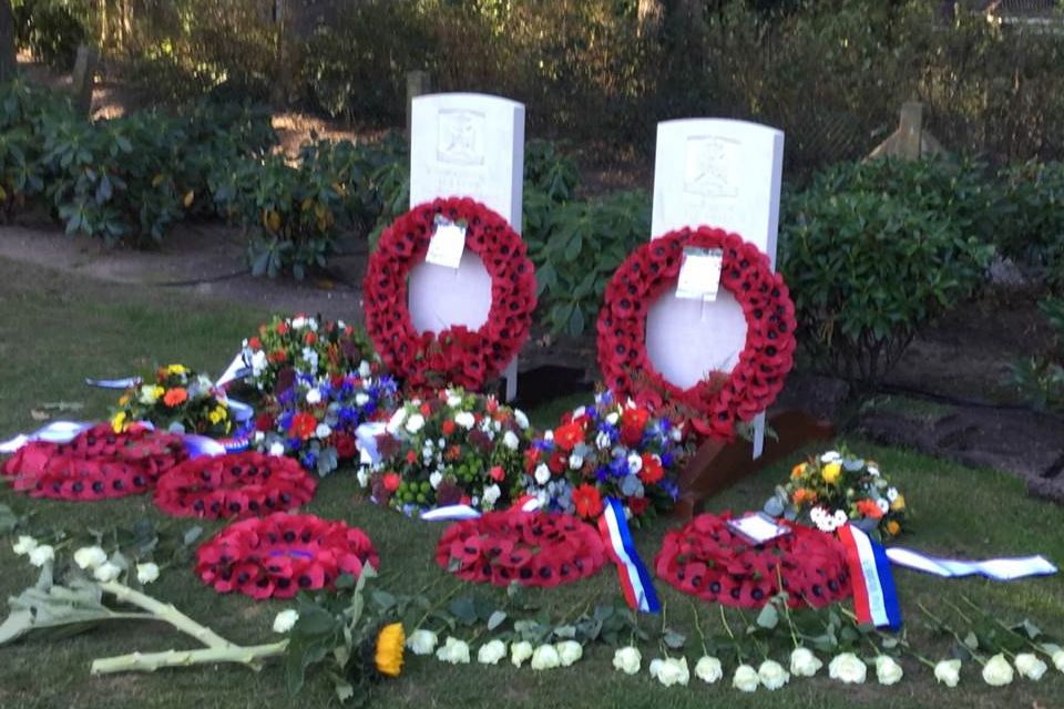 Poppy wreaths are laid at the headstones of LCpl Noble and Pte Lewis. Crown Copyright, All rights reserved