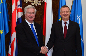 Defence Secretary Michael Fallon (left) shakes hands with the Polish Minister of National Defence Tomasz Siemoniak