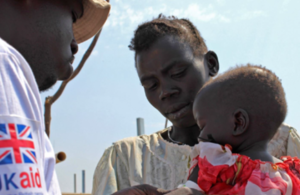 A child is screened for malnutrition in South Sudan. Picture: Nick Stanton/ International Medical Corps