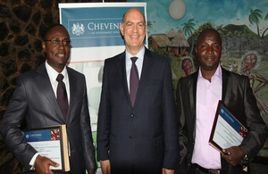 High Commissioner (centre), flanked by 2013/14 awardees