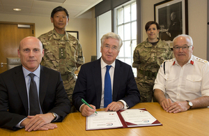 From left: CEO of G4S, Ashley Almanza, Defence Secretary Michael Fallon and General Sir Peter Wall signing the corporate covenant [Picture: Sergeant Pete Mobbs, Crown copyright]