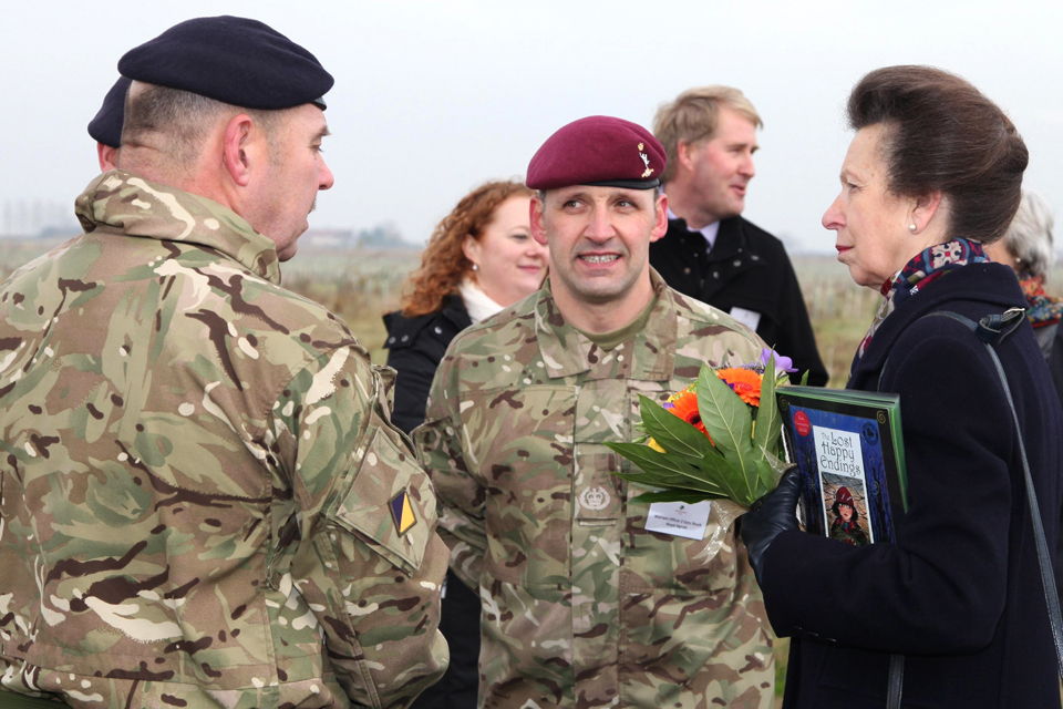 A soldier speaks with Princess Anne