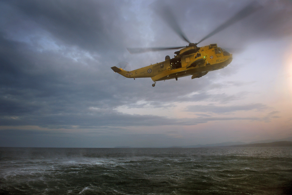RAF Sea King search and rescue helicopter over the sea (stock image)