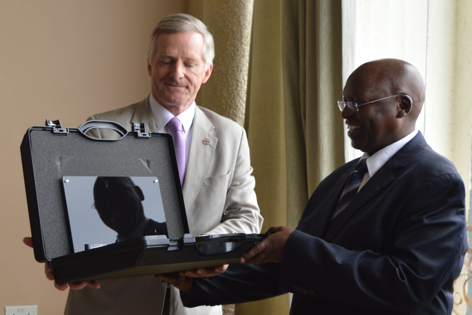 Handover of security equipment to CAA official