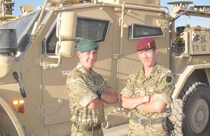 Marine James Hoyes, of 40 Commando Royal Marines, with his father Captain Christopher Wilcock, of 23 Engineer Regiment (Air Assault)