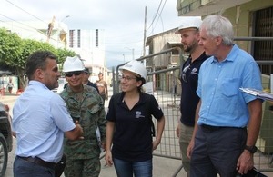 Minister Serrano with british engineers in the Earthquake crisis area
