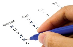 person filling in a survey