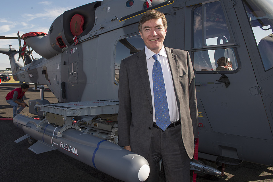 Philip Dunne with one of the new missiles attached to a Wildcat helicopter