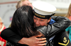 A sailor is welcomed home