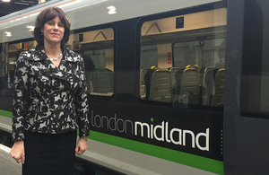 Claire Perry with London Midland train.