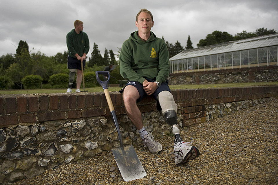 Marine Tristan Sykes, 30, from Norwich, outside the new greenhouse project at Headley Court 