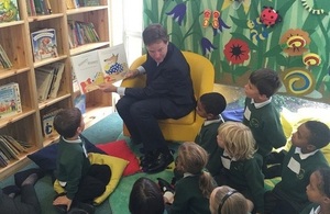 Nick Clegg reads to children at a primary school.