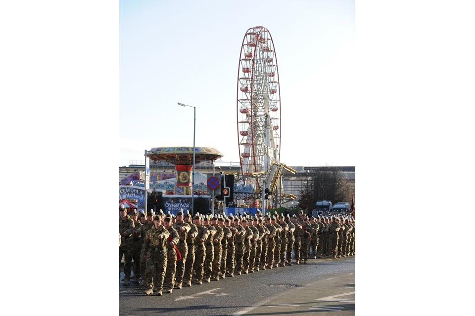 Soldiers of 1st Battalion The Royal Welsh parade through Swansea