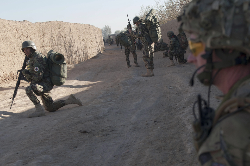 A 1 SCOTS soldier takes a knee