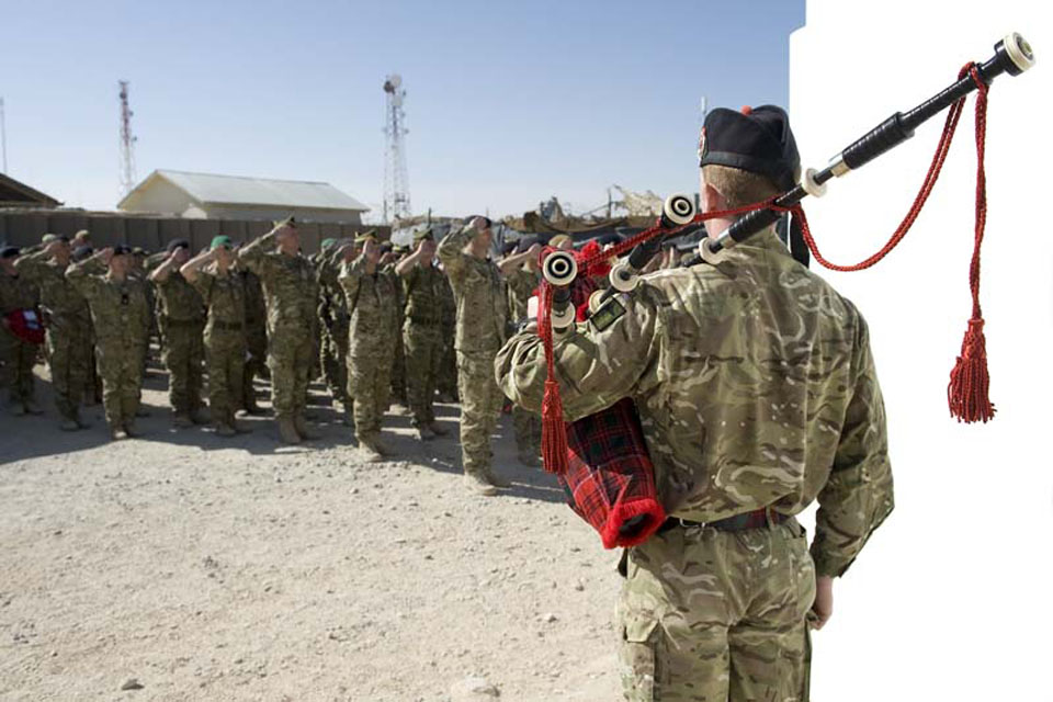 British Service personnel take part in a silent parade to mark Remembrance Sunday at the British base in Lashkar Gah, Helmand province  