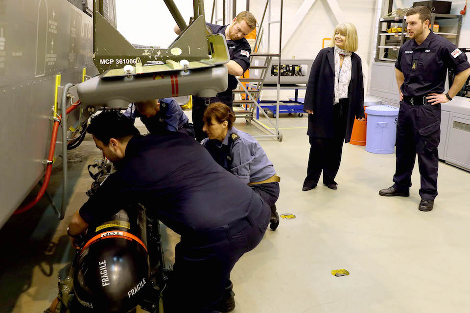 A weapon being loaded onto the Merlin Weapons Systems Trainer. Crown Copyright.