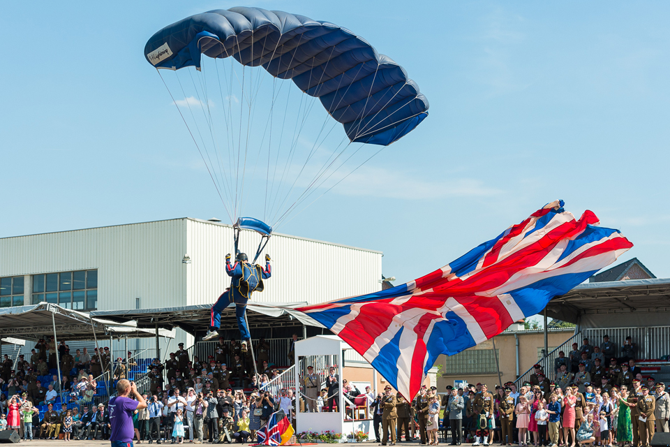 A parachutist flying the Union Flag