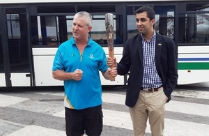 Scottish Minister arrives in Zambia and shows off Queen's Baton