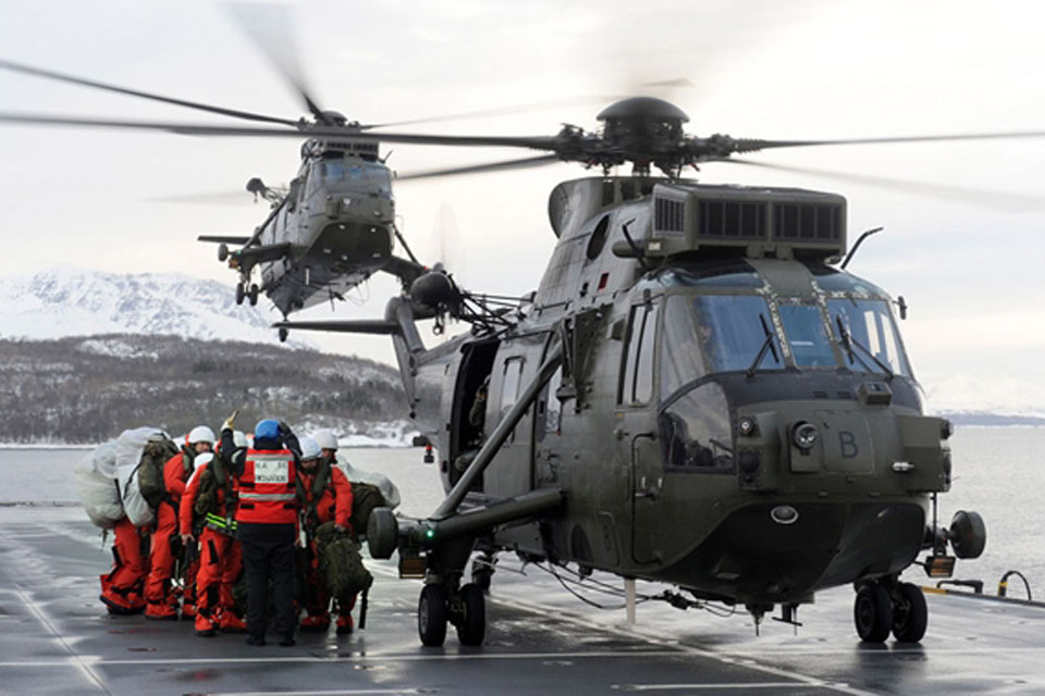 A vertical replenishment via helicopter involved the transfer of 90 Royal Marines commandos from HMS Illustrious to HMS Bulwark