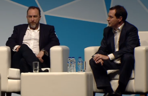 Chancellor and Jimmy Wales on stage at Campus Party