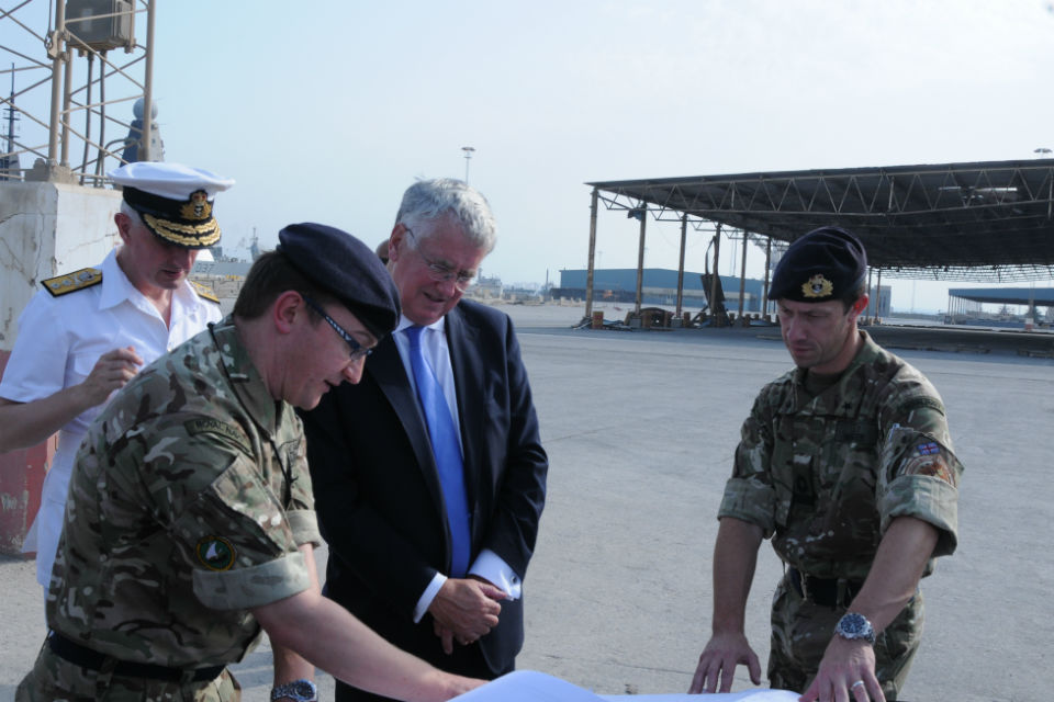 Defence Secretary Michael Fallon, Commander Jon Carrigan and Rear Admiral Simon Ancona