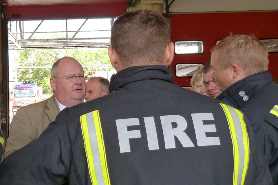Eric Pickles with firefighters