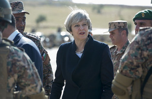 Prime Minister Theresa May visiting armed forces in Jordan.