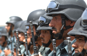 Afghan National Police recruits from both the basic and non-commissioned officer patrolman's course parade after an exercise