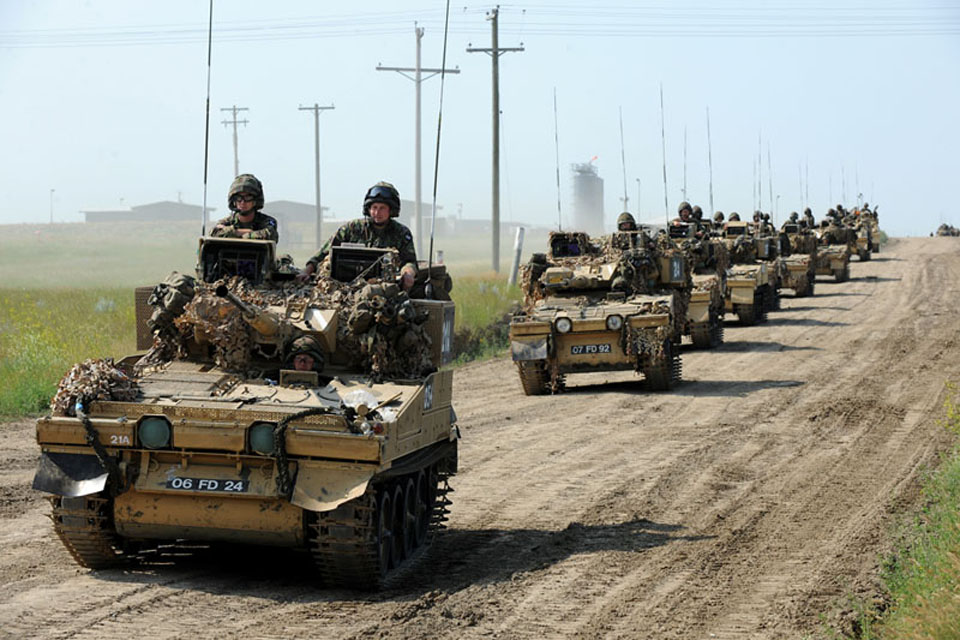 Armoured vehicles from 1st Battalion The Princess of Wales's Royal Regiment on the move during Exercise Prairie Thunder in Canada