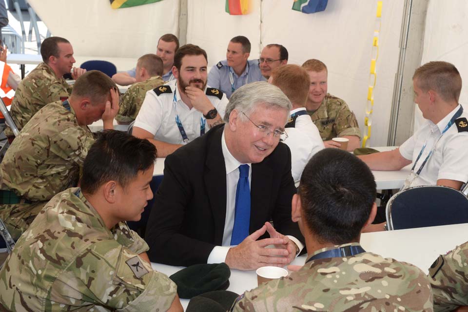 Michael Fallon chatting to members of the military venue security force