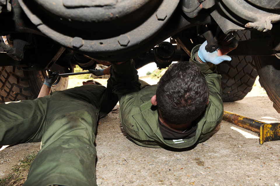 Vehicle mechanics of 7 Air Assault Battalion Royal Electrical and Mechanical Engineers at work during Exercise Active Chariot