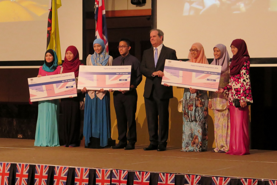British High Commissioner with the first, second and third place winners of the Digital Scrapbook Competition 2014