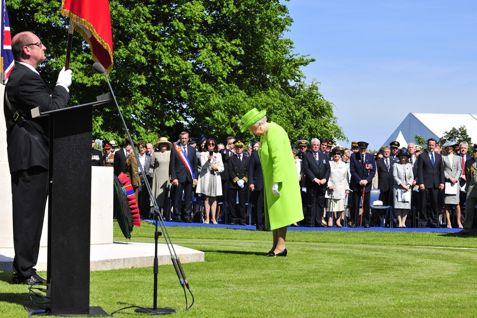 Her Majesty The Queen lays a wreath at Bayeux War Cemetery