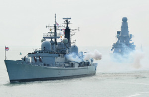 HMS Edinburgh's port side smokes after firing a 21-gun salute on her final entry into Portsmouth – Type 45 destroyer HMS Defender follows in her wake [Picture: Leading Airman (Photographer) Guy Pool, Crown copyright]