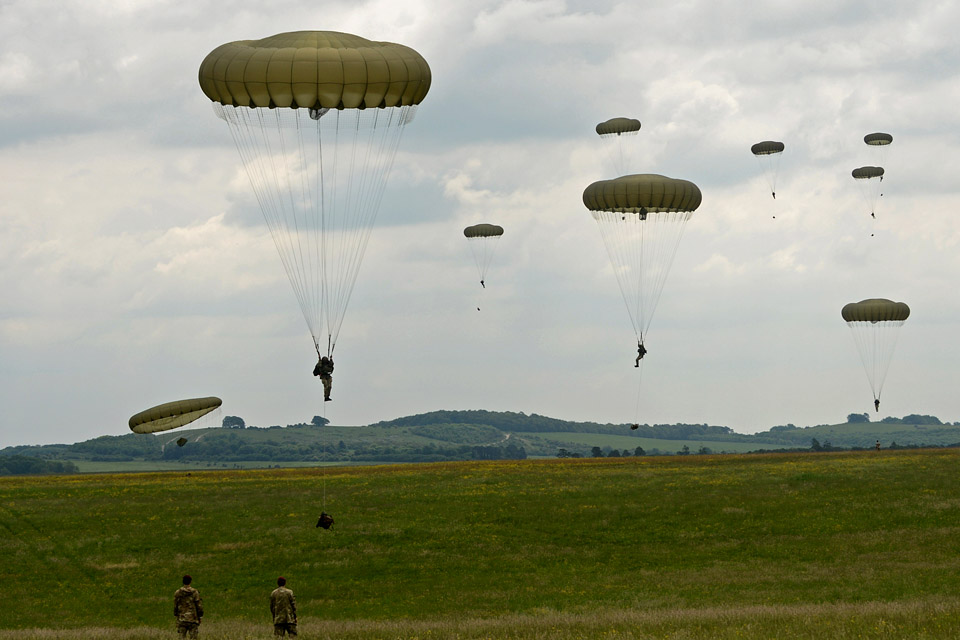 British and US soldiers parachute onto Salisbury Plain