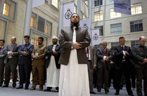 Imam Asim Hafiz leads armed forces Muslims in prayer at the launch of the Armed Forces Muslim Forum [Picture: Sergeant Pete Mobbs, Crown copyright]