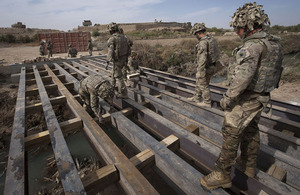 Sappers from 21 Engineer Regiment during construction of the 'Golden Egg' bridge in Nahr-e Saraj