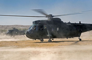 Royal Navy Sea King helicopters land at a forward operating base in Helmand province (stock image)